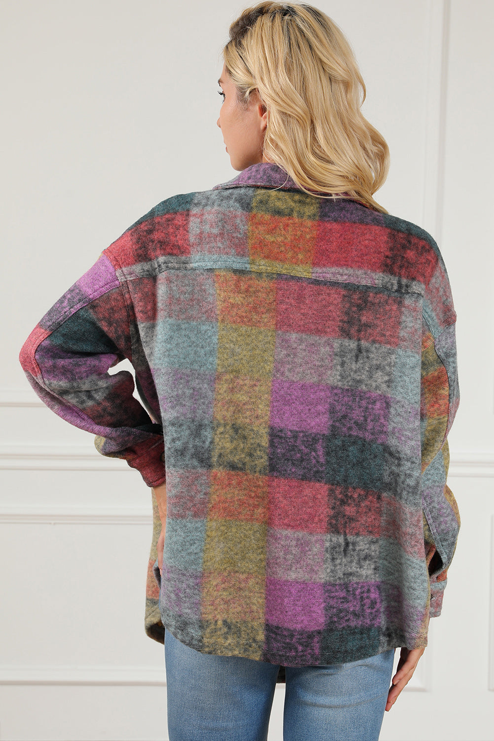 Multicolor brushed plaid shacket with collar and long sleeves.