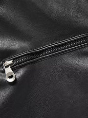 Black faux leather sport jacket detail with silver zipper and pull tab.
