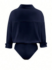 Navy blue long sleeve collared bodysuit with button detail on cuffs
