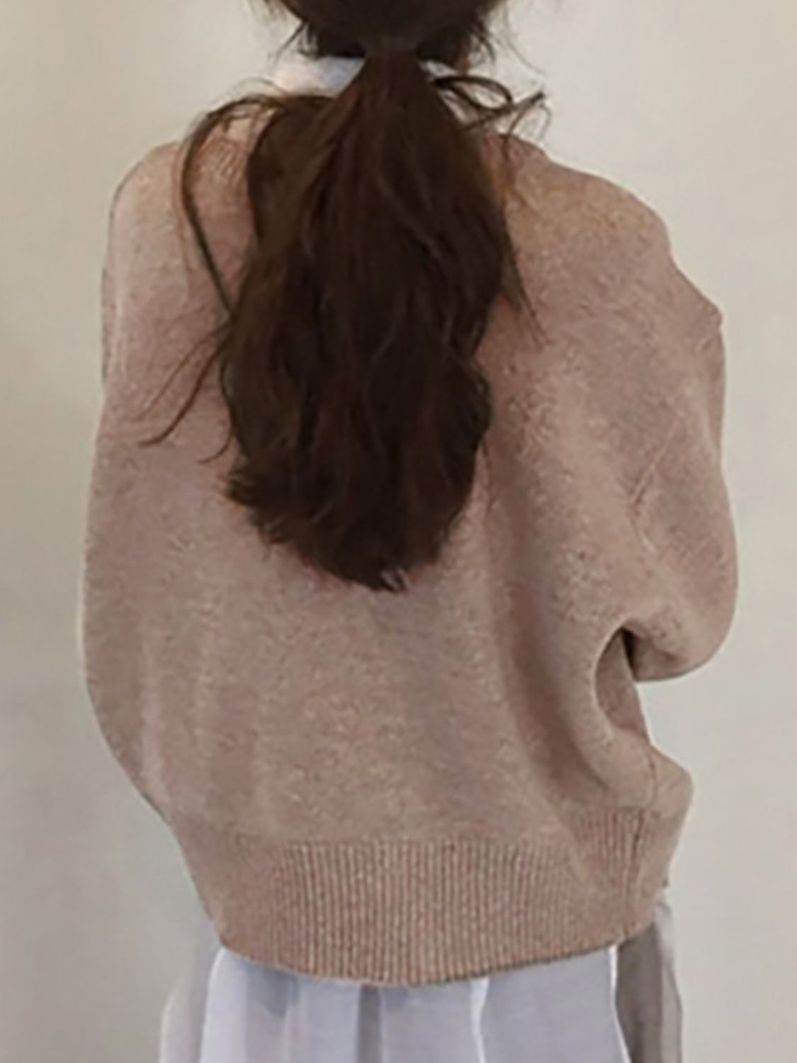 Asymmetric button-up knit cardigan in Khaki with ribbed hem and cuffs.