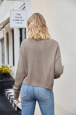 Textured knit cropped cardigan in mocha with button details.