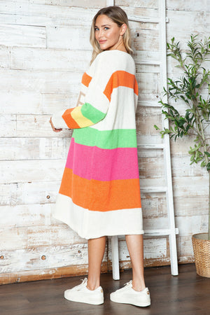 Beige midi sweater dress with rainbow stripes and peace lettering detail.