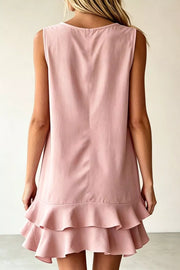 Dusty pink sleeveless mini dress with tiered ruffle hem
