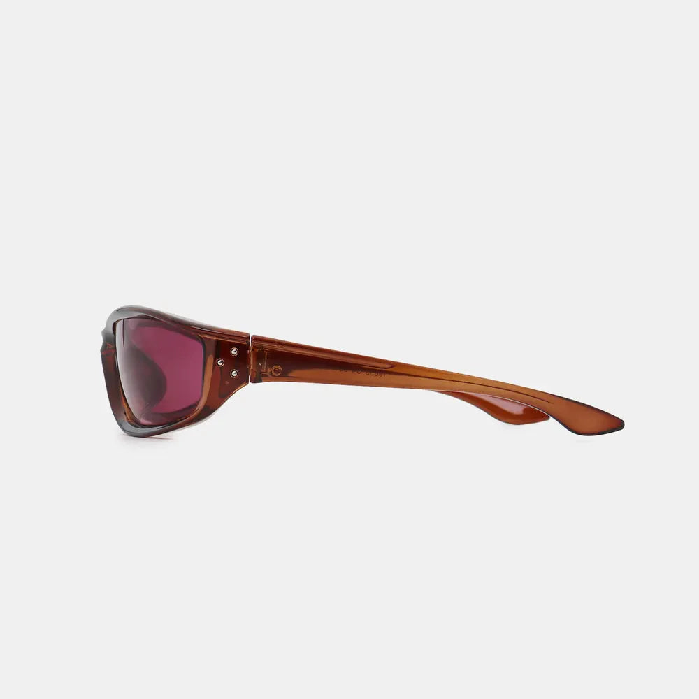 Brown sculpted sport sunglasses with dark lenses and silver stud details.