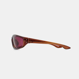 Brown sculpted sport sunglasses with dark lenses and silver stud details.
