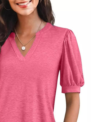 Puff sleeve notched V-neck t-shirt in Rose Pink with a textured knit fabric.