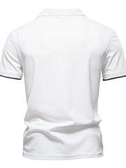 White polo shirt with dark trim on sleeves.