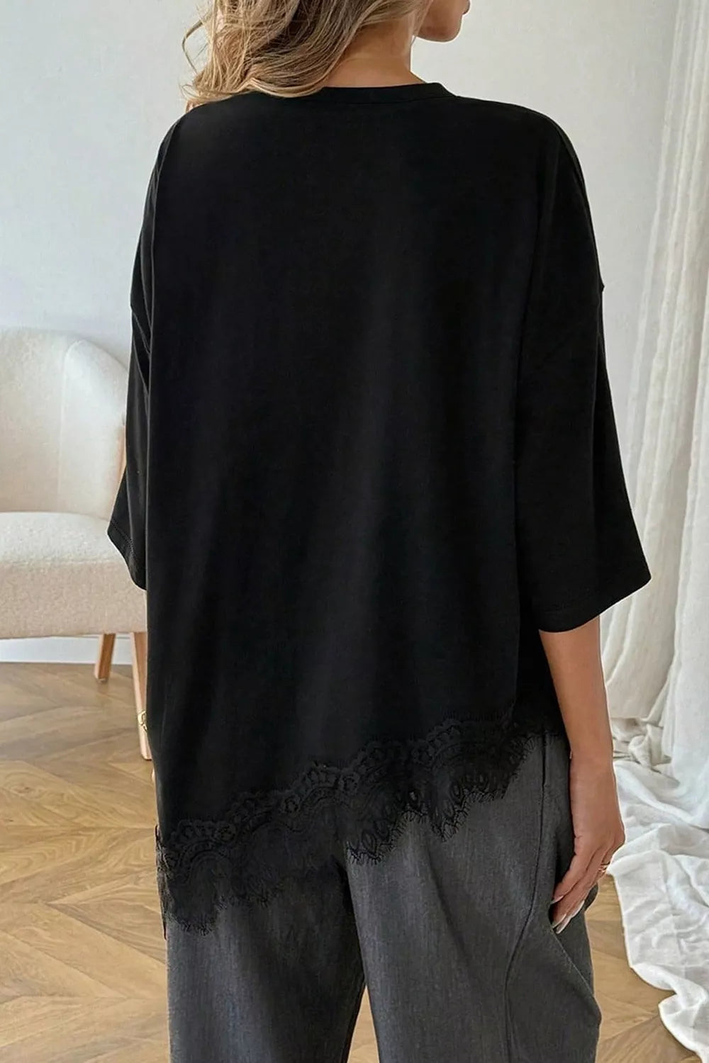 Lace Asymmetrical Hem Round Neck T-shirt in Black, back view