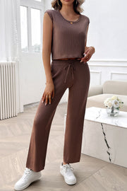 Brown ribbed knit cropped lounge set with wide-leg pants and a drawstring waist.