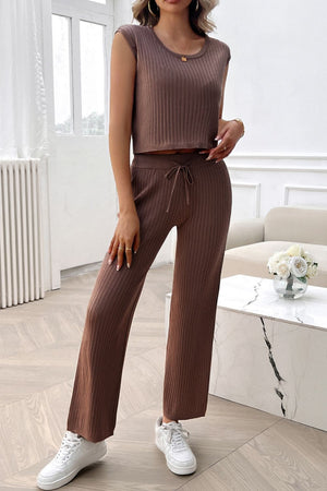 Brown ribbed knit cropped lounge set with wide-leg pants and a drawstring waist.