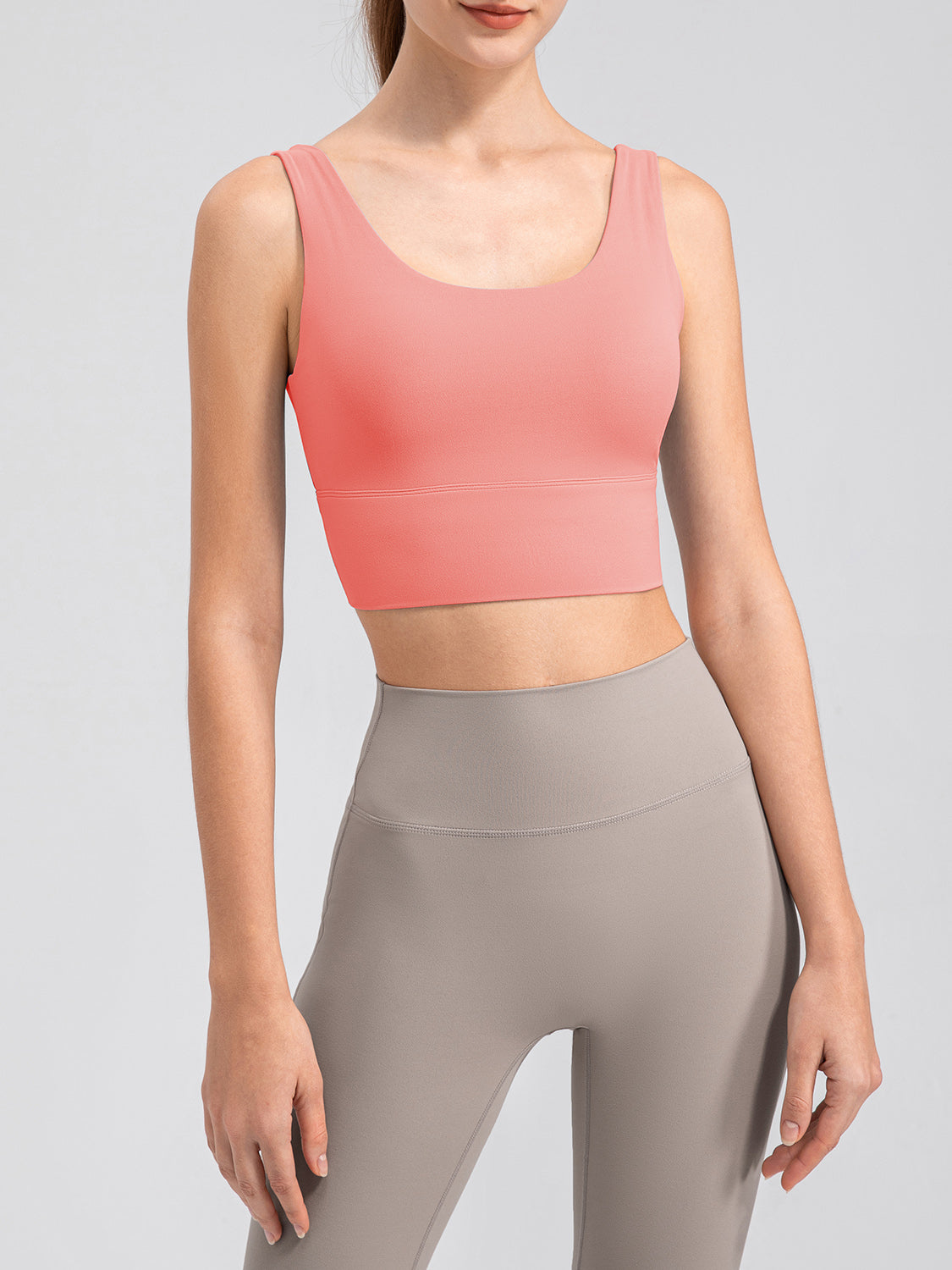 Coral performance crop top with scoop neck and wide band