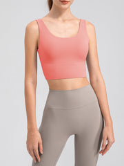Coral performance crop top with scoop neck and wide band