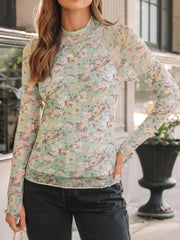 Light green floral mesh second-skin top with mock neck and lettuce hem cuffs.