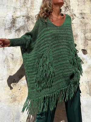 Dark green striped knit poncho sweater with fringe detail and V-neck