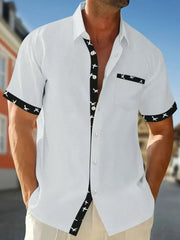 White waffle weave short sleeve shirt with airplane print contrast trim and pocket.