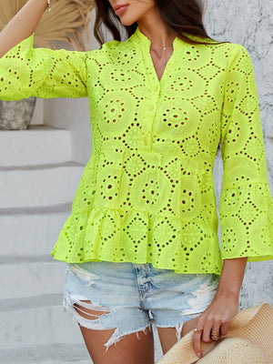 Neon yellow eyelet embroidered peplum blouse with ruffles and bell sleeves.