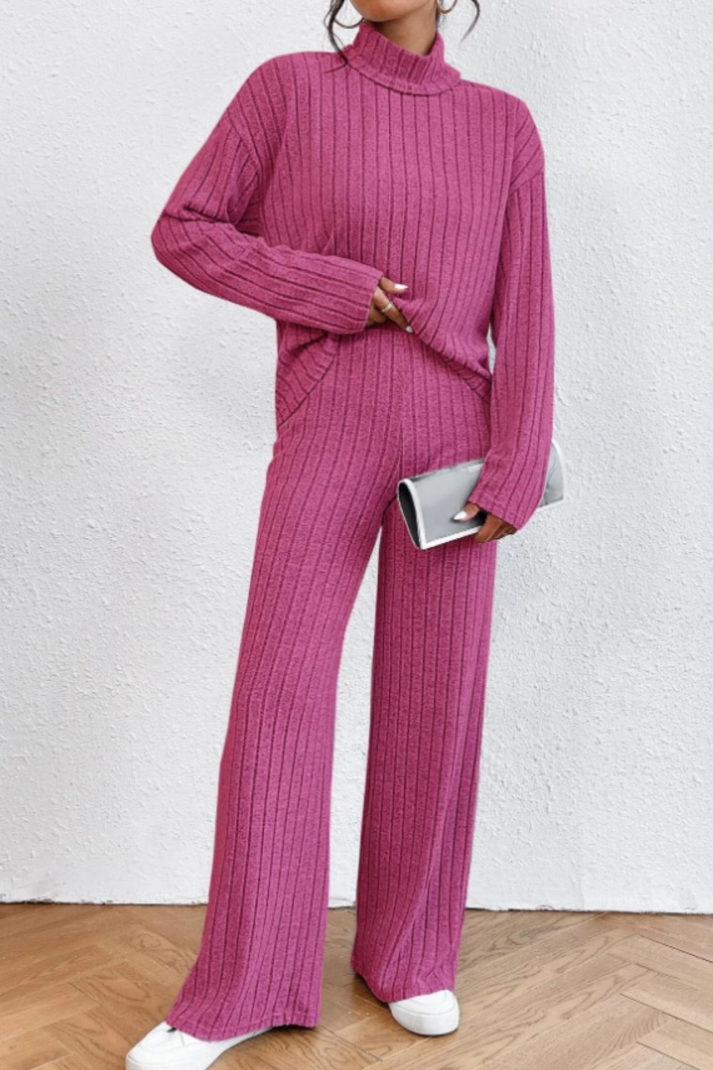 Hot Pink ribbed knit turtleneck loungewear set with wide leg pants and long sleeves.