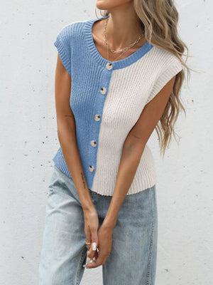 Two-tone knit cardigan with buttons, blue and cream, round neck, short sleeves.