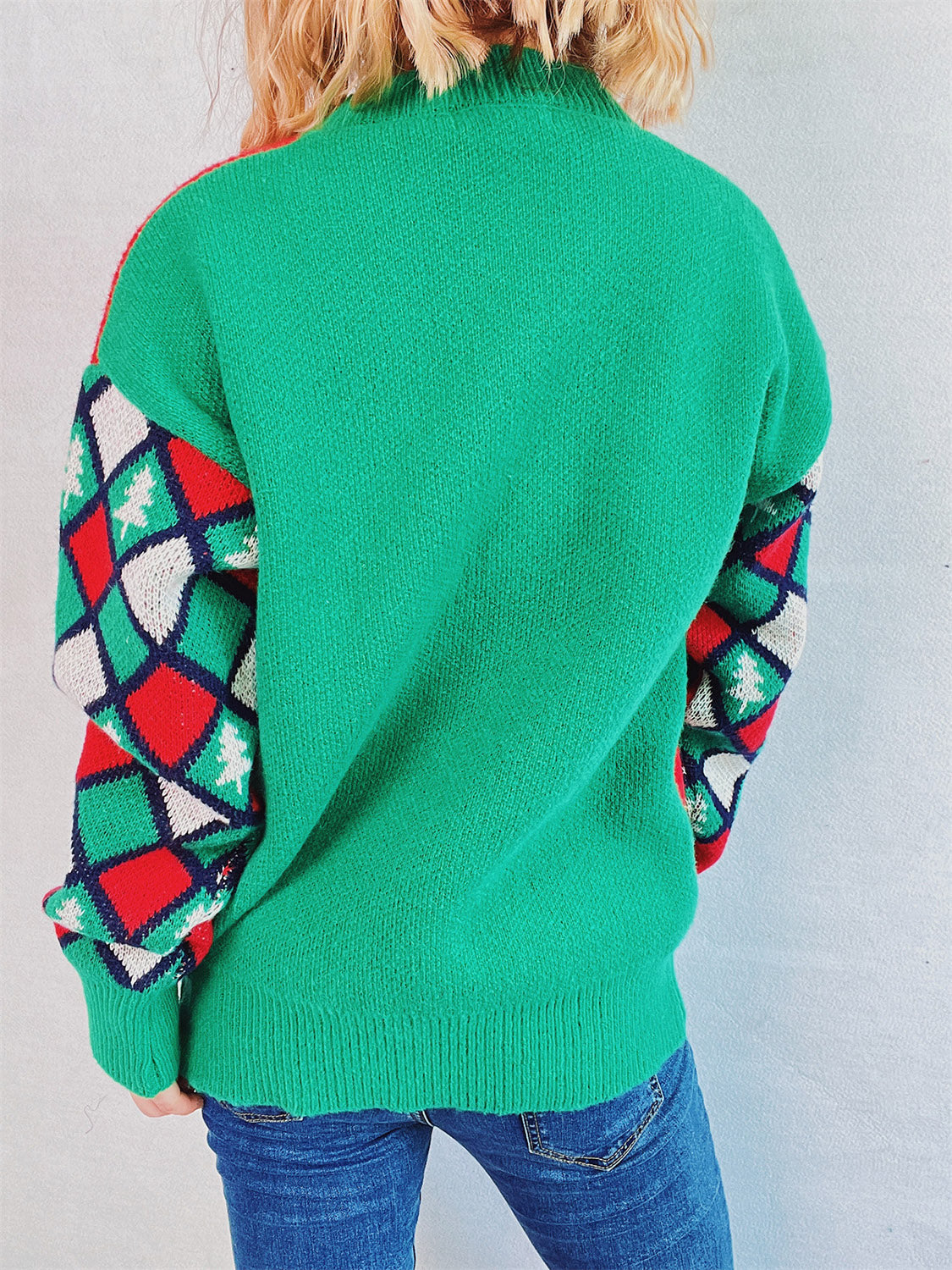 Green crewneck sweater with argyle and Christmas tree sleeves