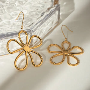 Gold sculpted petal drop earrings with a flower design, 18K gold-plated.