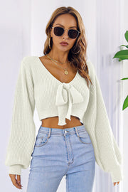 White acrylic tie-front balloon sleeve crop knit sweater with V-neck
