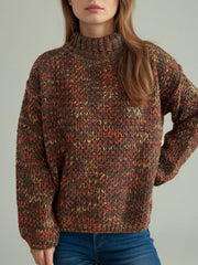 Textured mélange mock neck pullover sweater in brown with orange and yellow flecks.