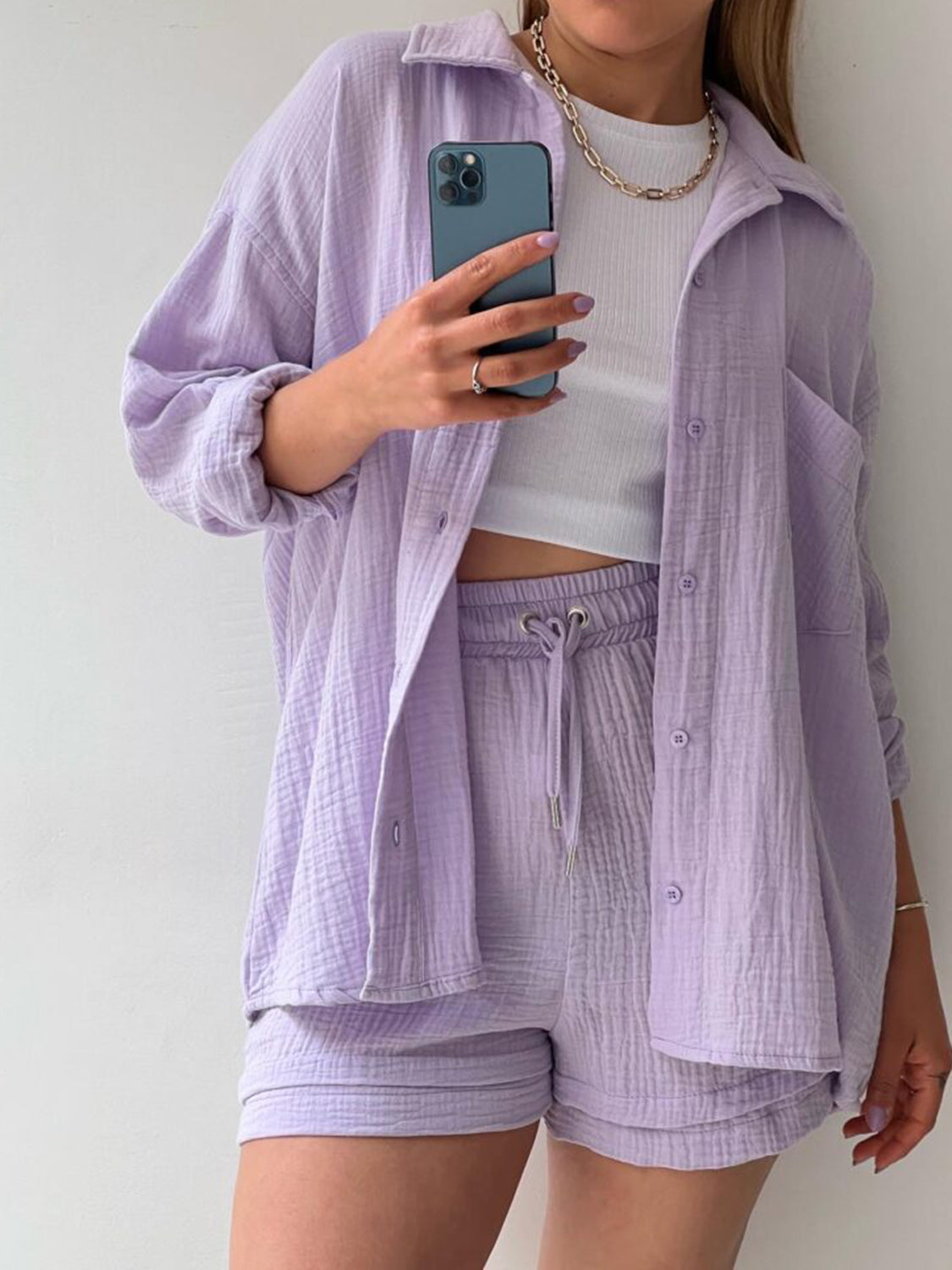 Lavender textured gauze shirt and shorts set with drawstring shorts and button-up shirt.