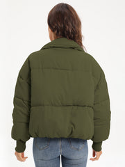 Moss green padded bomber jacket with ribbed cuffs and collar, shown from the back.