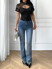 Black sheer cutout t-shirt with mandarin collar and floral pattern.