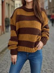 Chunky knit jumper with brown and tan stripes, crew neck, and ribbed cuffs.