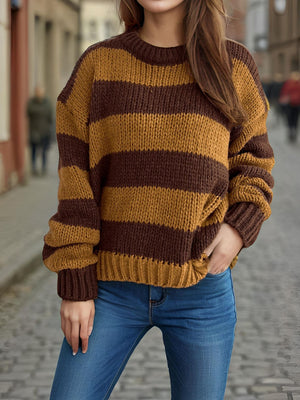 Chunky knit jumper with brown and tan stripes, crew neck, and ribbed cuffs.