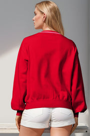 Red acrylic cardigan with striped neckline and balloon sleeves