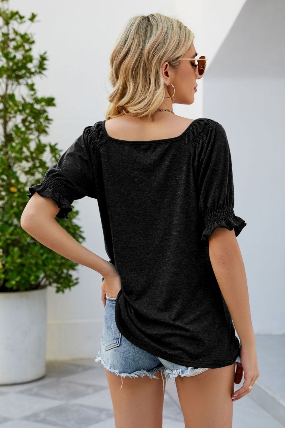 Gathered square neck black blouse with puff sleeves
