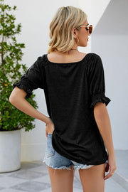 Gathered square neck black blouse with puff sleeves
