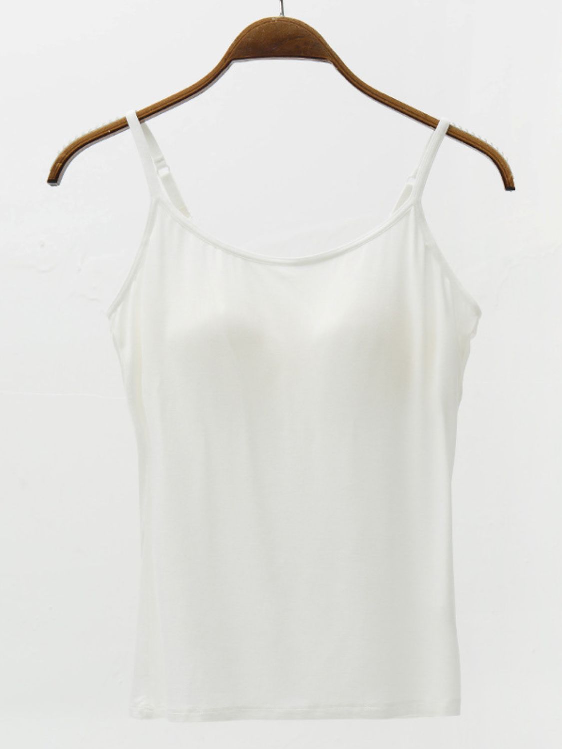 White cami with built-in support and adjustable straps.