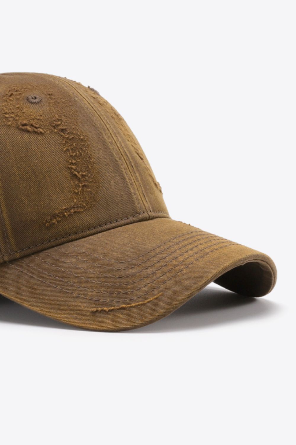 Distressed chestnut baseball cap with frayed details and stitched brim.