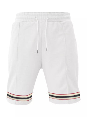 White textured knit drawstring shorts with striped hem detail.