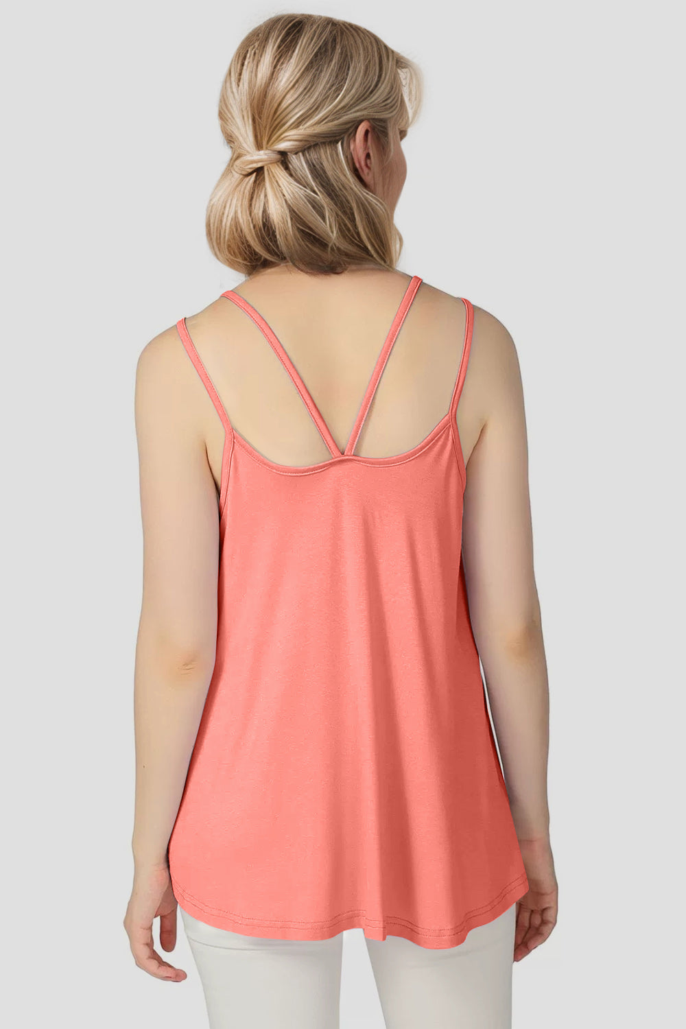 Double strap trapeze cami in coral pink, with a V-back detail.