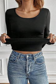 Black long sleeve thermal top with scoop neck, showing soft interior fabric.