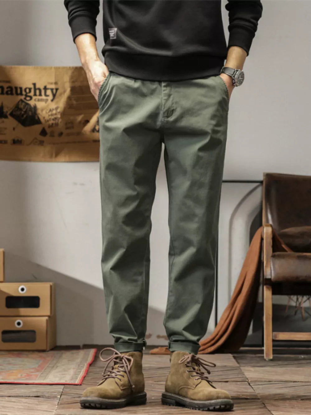 Men's plus size slim fit ankle pants in military green with a tapered leg and cuffed hem.