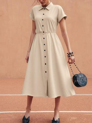 Beige button-down midi shirt dress with pockets, cinched waist, and classic collar.