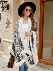 Feather print cape with faux fur trim in charcoal and ivory, acrylic fabric
