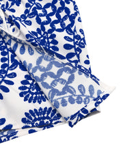Floral tie skort with slit in blue and white, featuring a drawstring detail.