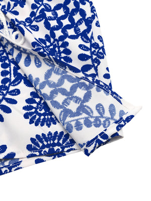 Floral tie skort with slit in blue and white, featuring a drawstring detail.