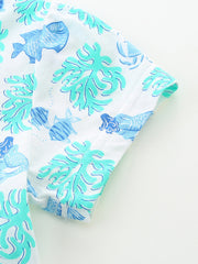 Toddler cotton dress with blue fish and coral print, short sleeves.