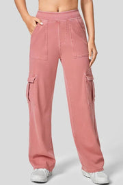 Utility denim wide-leg cargo pants in Burnt Coral with front pockets and side cargo pockets.