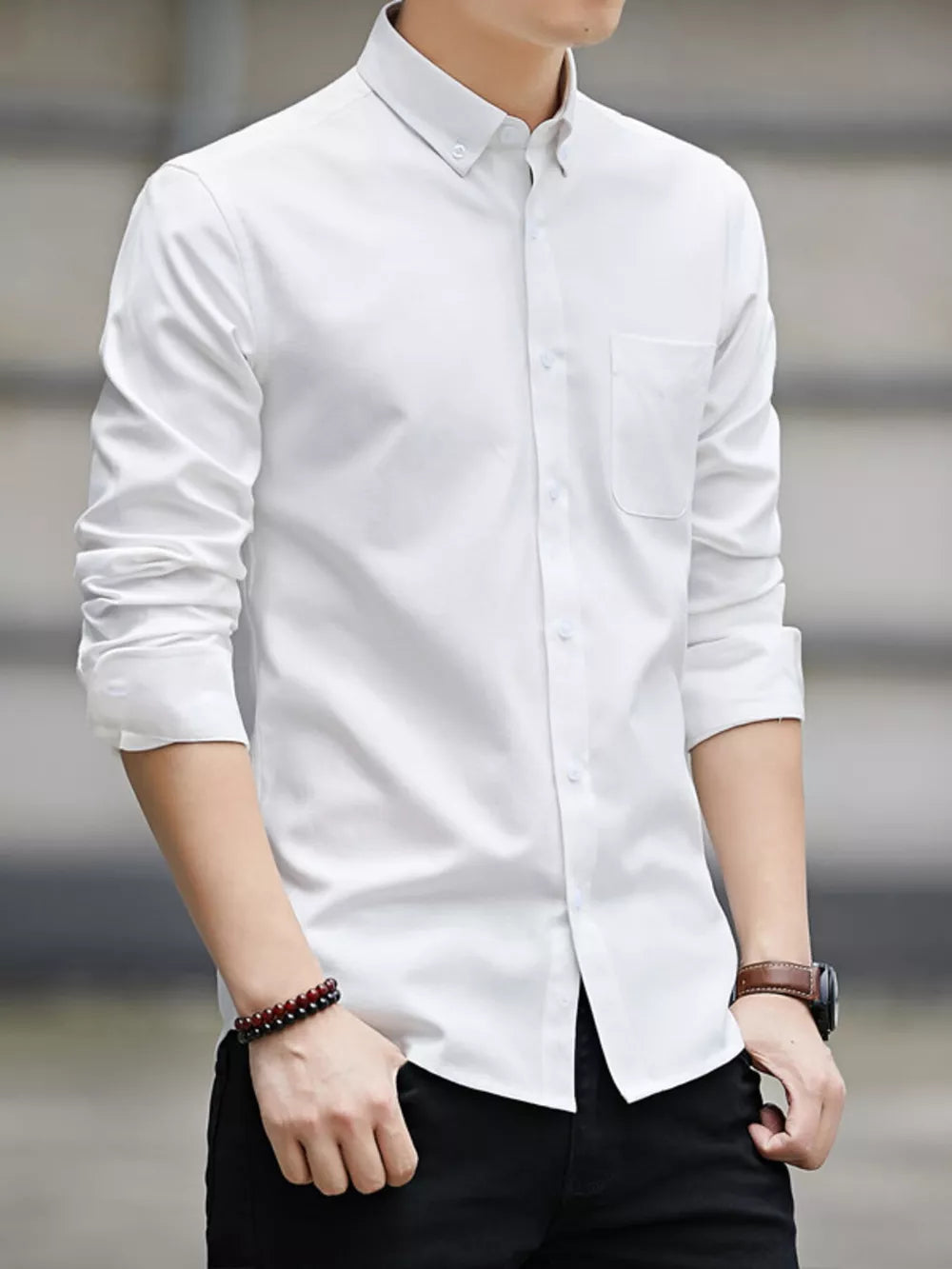 White cotton button-down casual shirt with pocket and button collar.