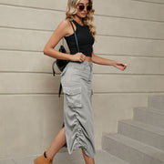 Mid gray denim cargo midi skirt with adjustable ruching detail and side pockets.