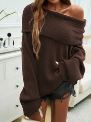 Chocolate ribbed knit off-the-shoulder sweater with wide sleeves.