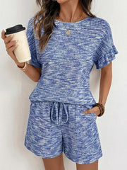 Blue ruffled sleeve two-piece set with drawstring shorts and textured fabric.